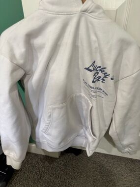 White 'Lucky Bar' Graphic Hoodie with Blue Print size small in men's